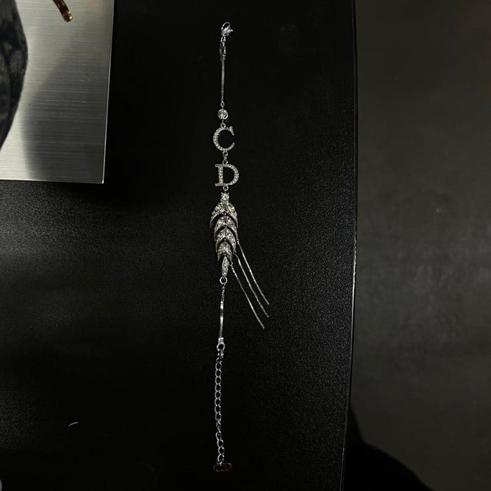 Christian Dior silver diamanté feather bracelet