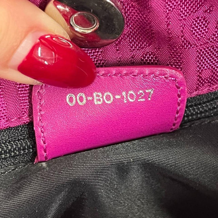 Christian Dior fuschia bow charm bag