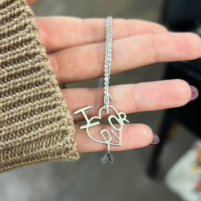 Christian Dior silver heart necklace