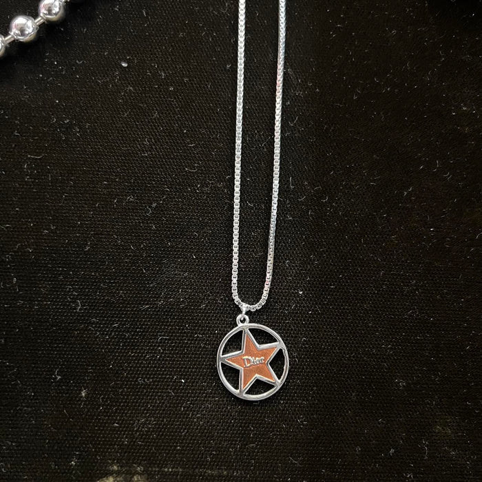 Christian Dior silver red star necklace