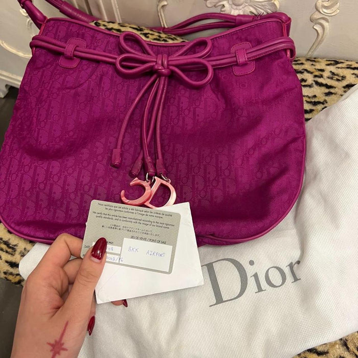 Christian Dior fuschia bow charm bag