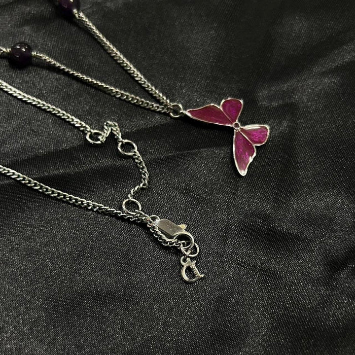 Christian Dior silver butterfly necklace