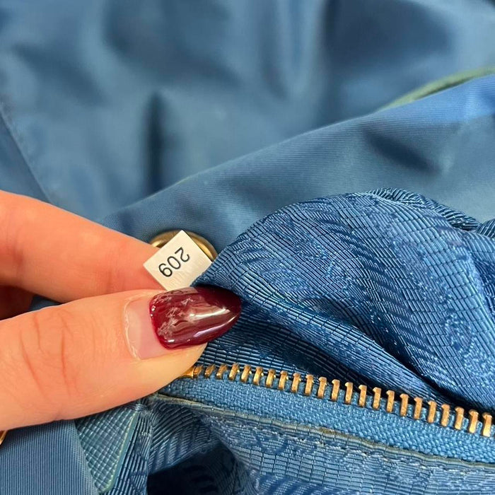 Prada blue nylon backpack