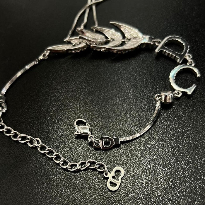Christian Dior silver diamanté feather bracelet