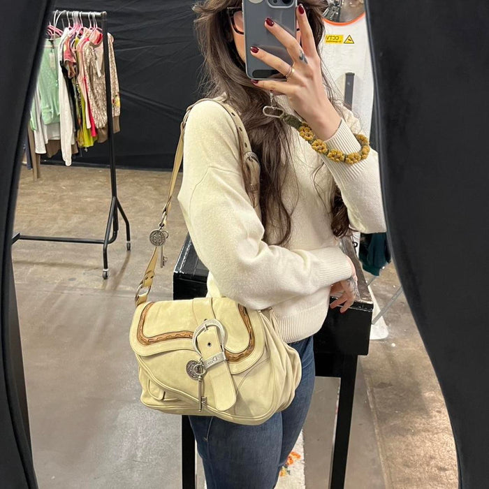 Christian Dior cream gaucho bag