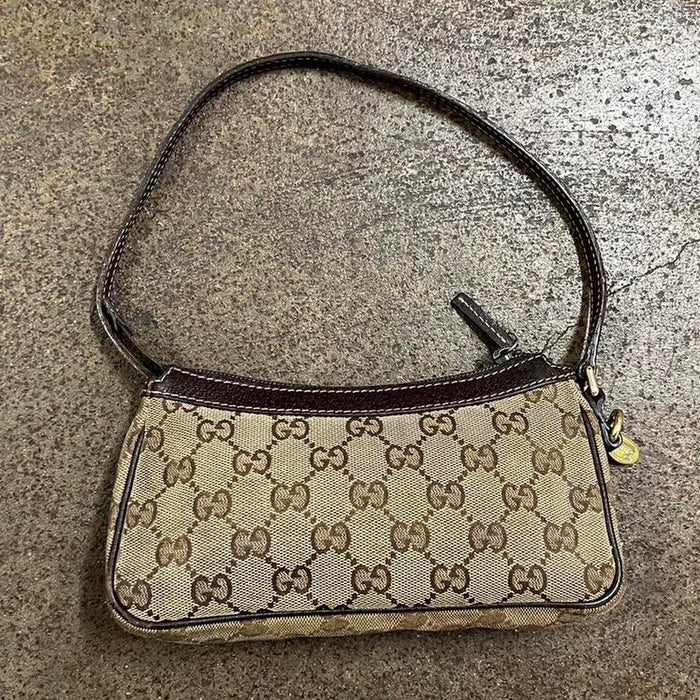 Gucci charm pochette bag