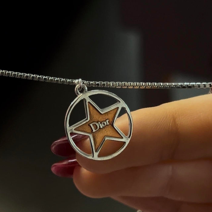 Christian Dior silver red star necklace