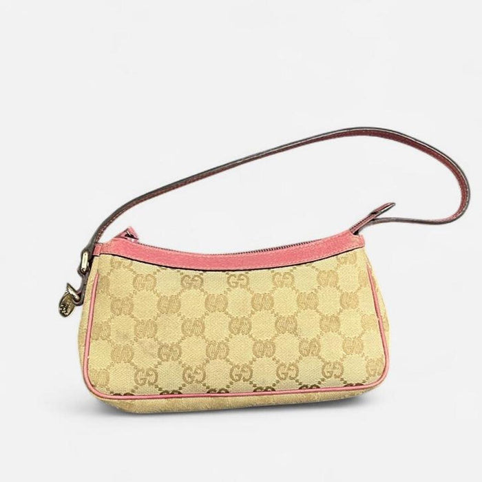 Gucci pink pochette with butterfly charm