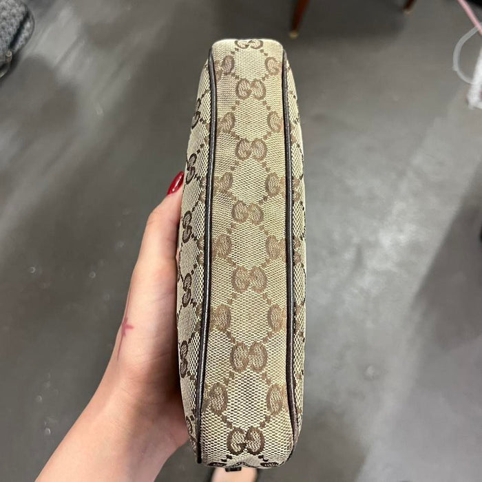 Gucci charm pochette bag
