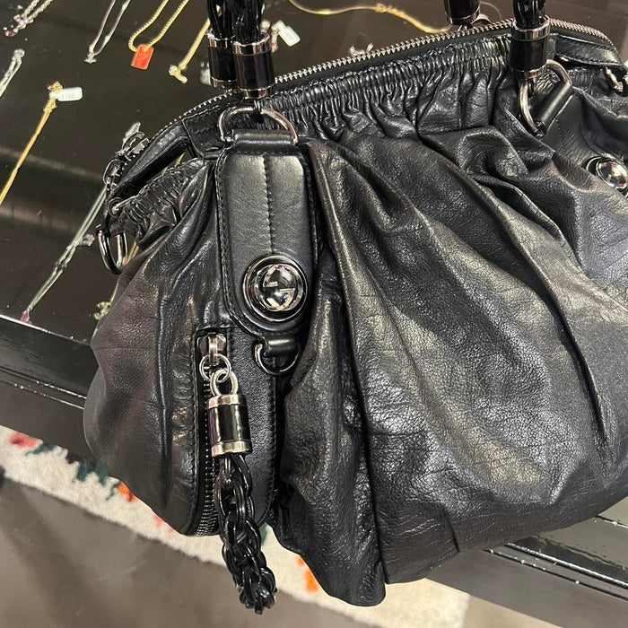 Gucci black leather galaxy bag