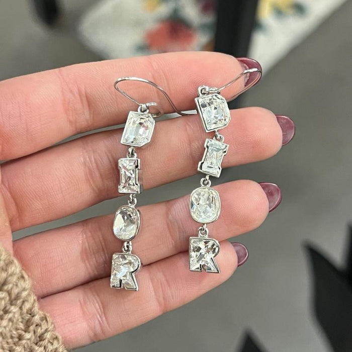 Christian Dior crystal spell out drop earrings