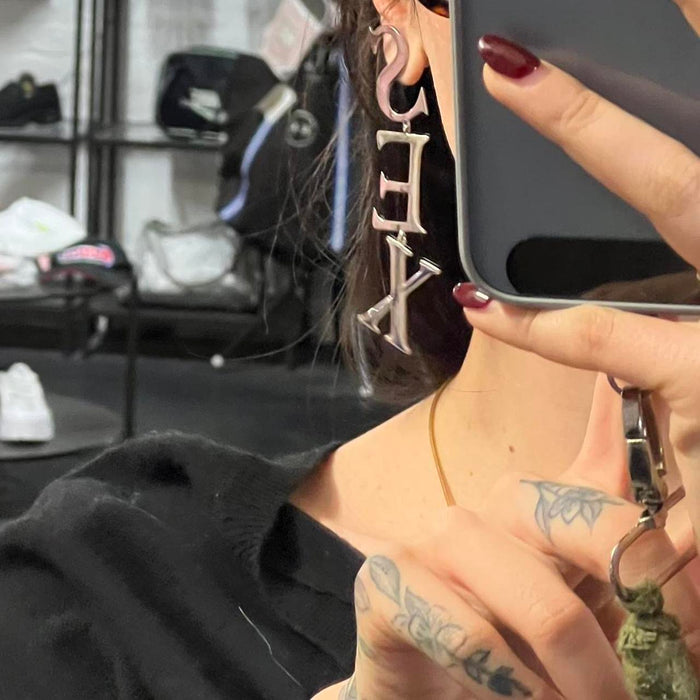 Vivienne Westwood silver sex earrings