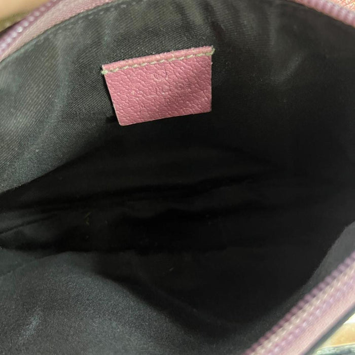 Gucci pink pochette with butterfly charm