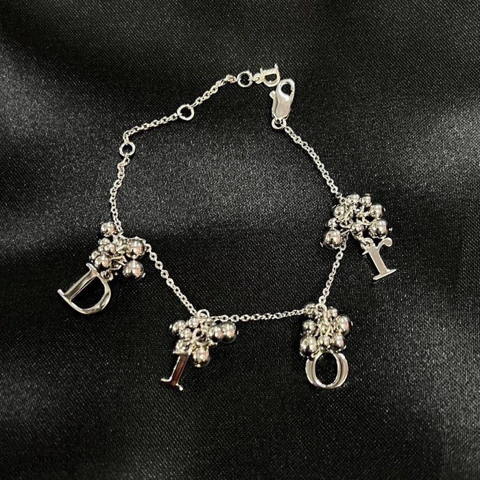 Christian Dior silver cluster spellout bracelet
