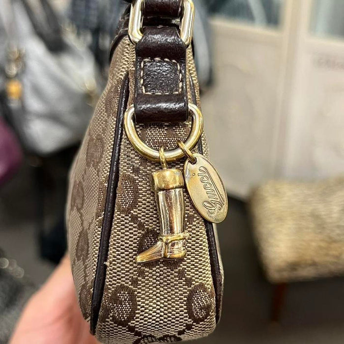 Gucci charm pochette bag