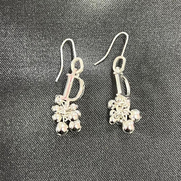 Christian Dior silver cluster D earrings