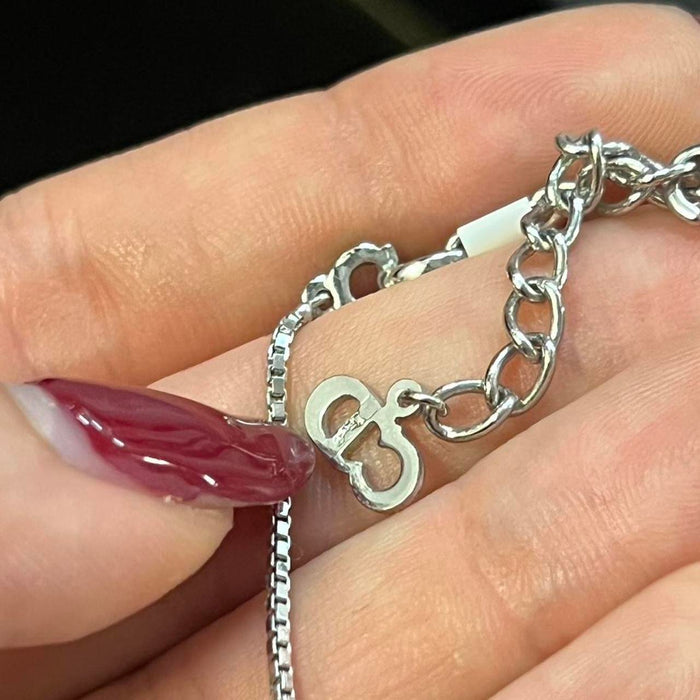 Christian Dior silver red star necklace