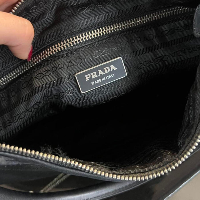 Prada black leather moon shoulder bag