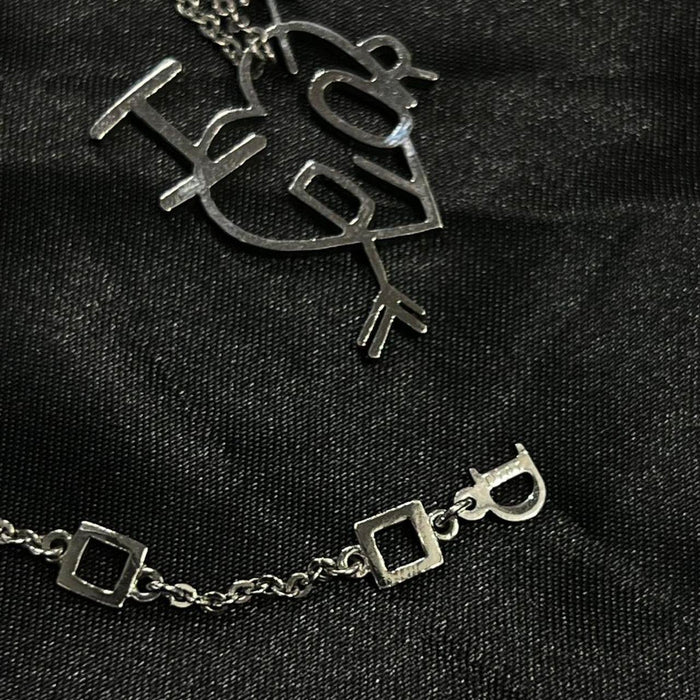 Christian Dior silver heart necklace
