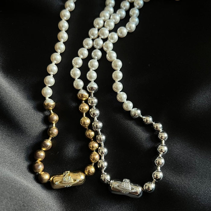 Vivienne Westwood pearl gold orb necklace