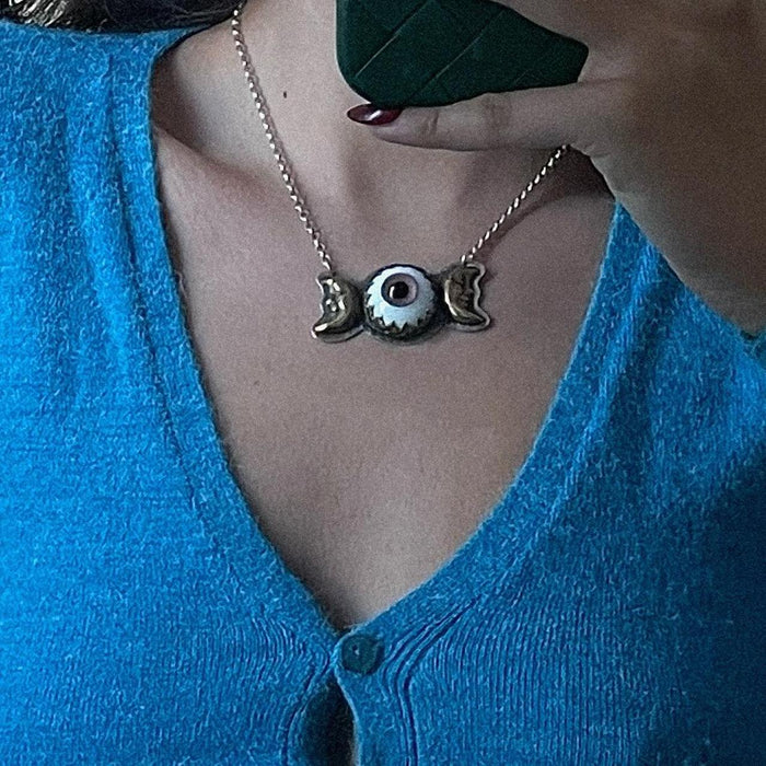 Handmade prosthetic pink eye & moons sterling silver necklace