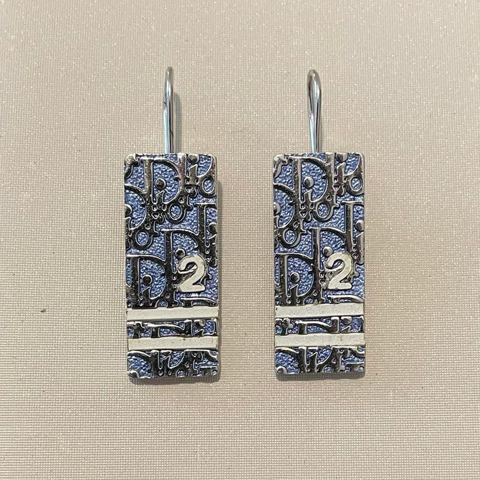Dior silver blue monogram tag earrings