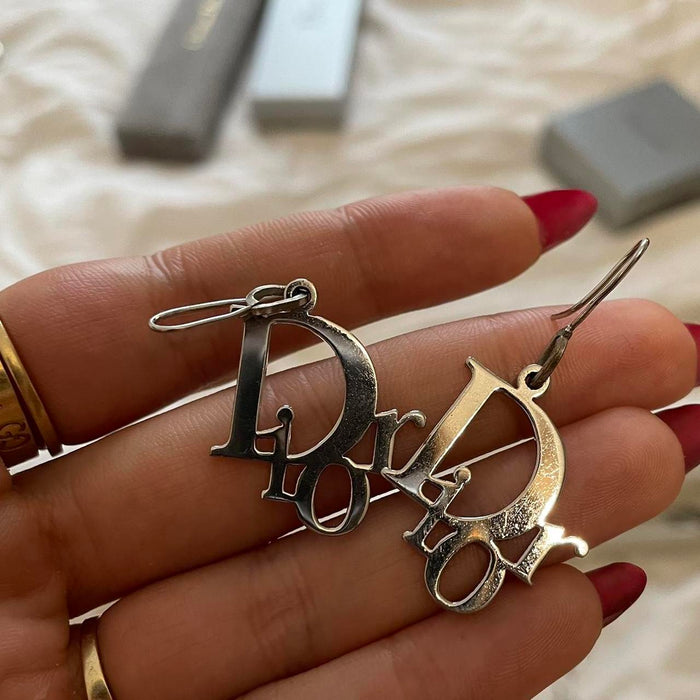 Dior silver logo spellout drop earrings